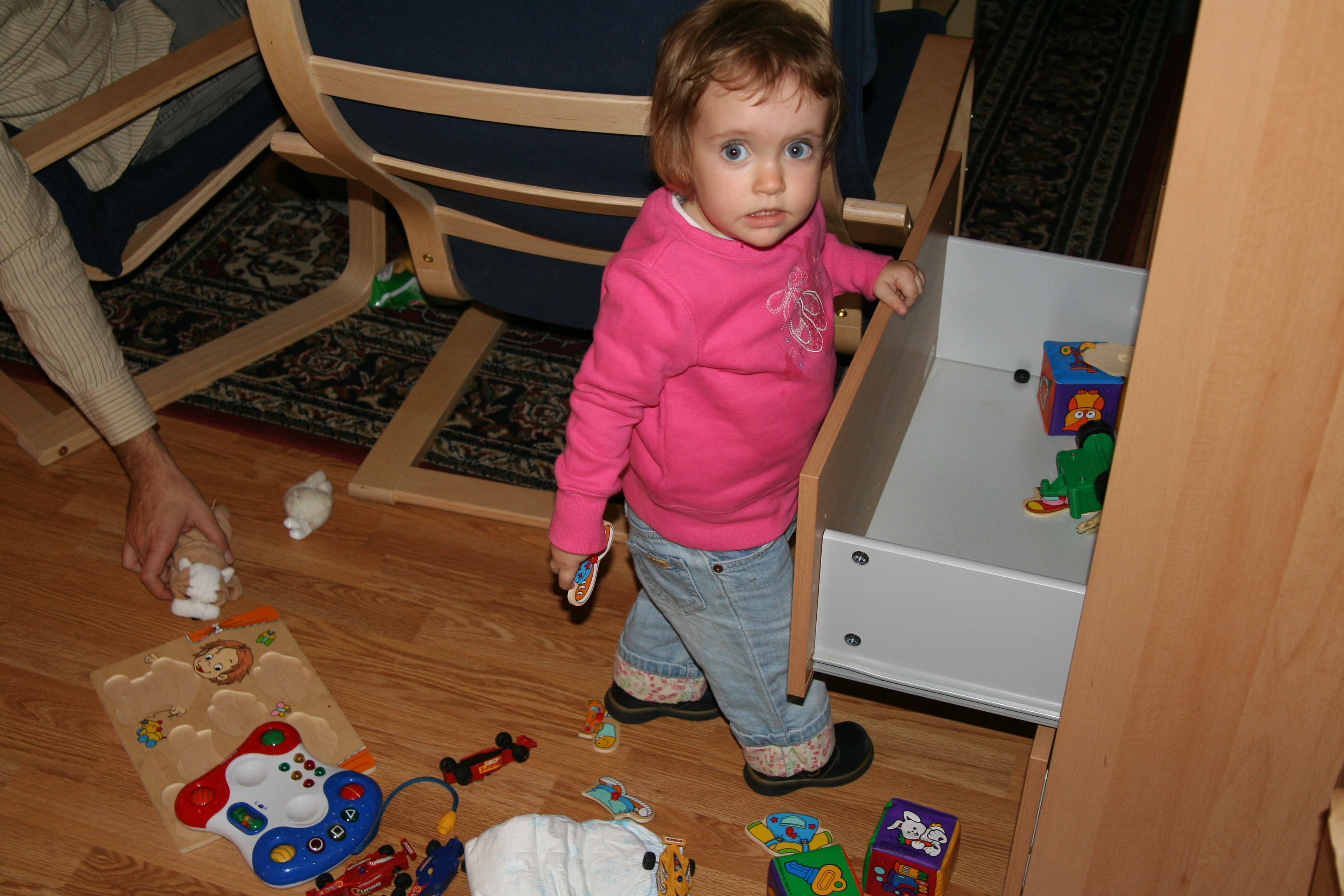 Sophia discovers the toy drawer.